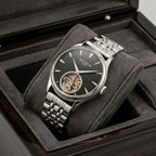 Patek Philippe Men’s Black Textured Dial Open-Heart Watch