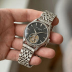 Patek Philippe Men’s Black Textured Dial Open-Heart Watch